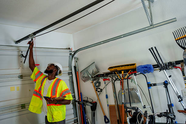 Professional Garage Door Installation technician working in Lakewood, OH